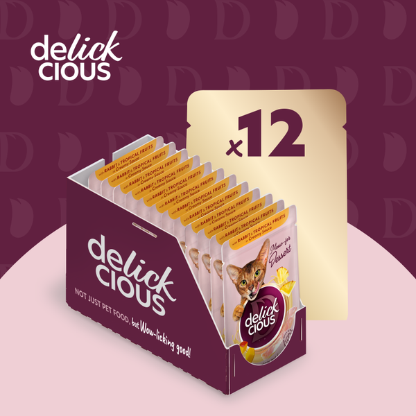 DELICKCIOUS™ „Dribsniai su triušiena ir tropiniais vaisiais grietinėlės padaže“. Konservuotas pašaro papildas suaugusioms katėms.
